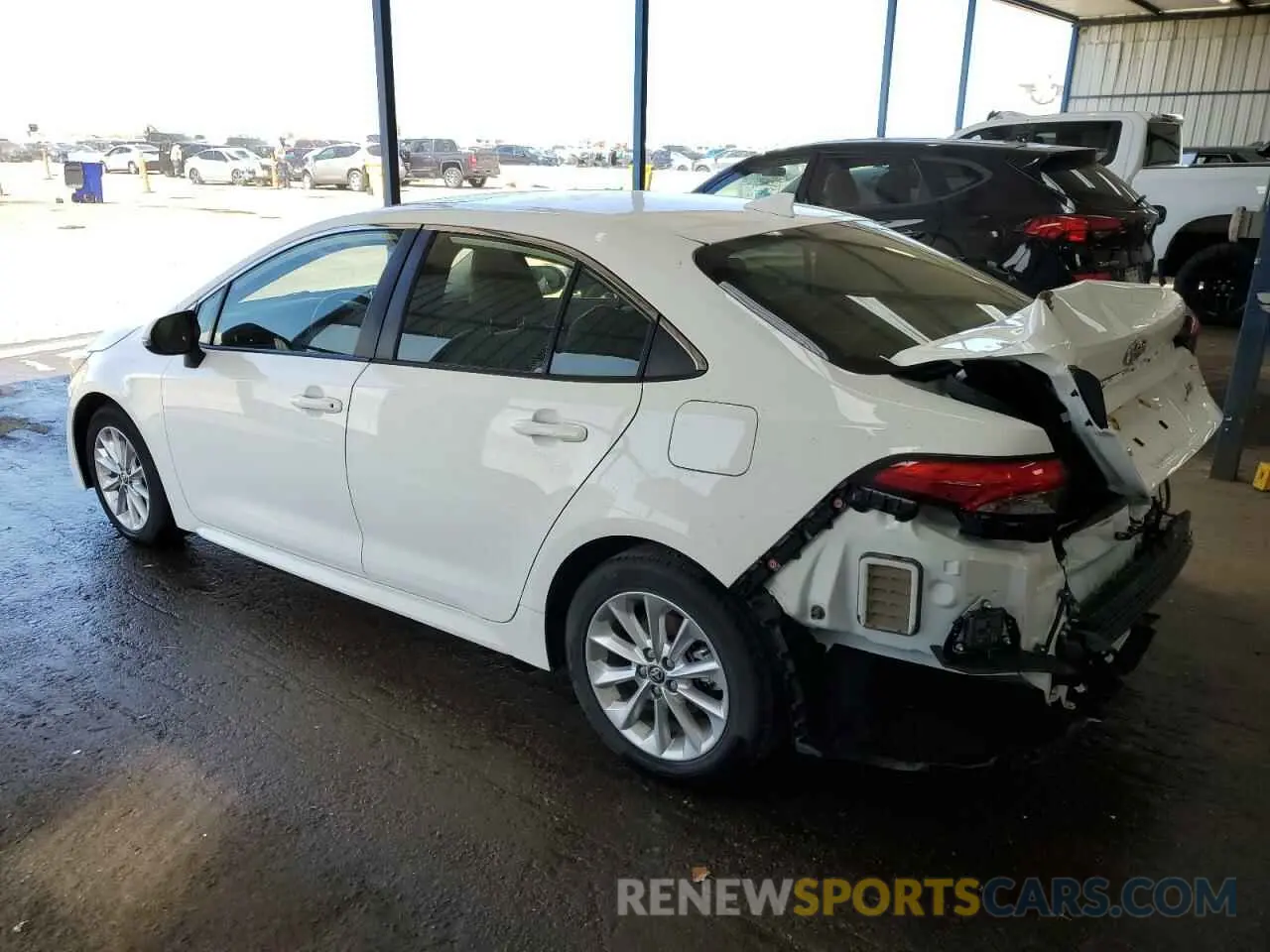 2 fotografías del automóvil dañado JTDFPMAE9N3016887 TOYOTA COROLLA 2022