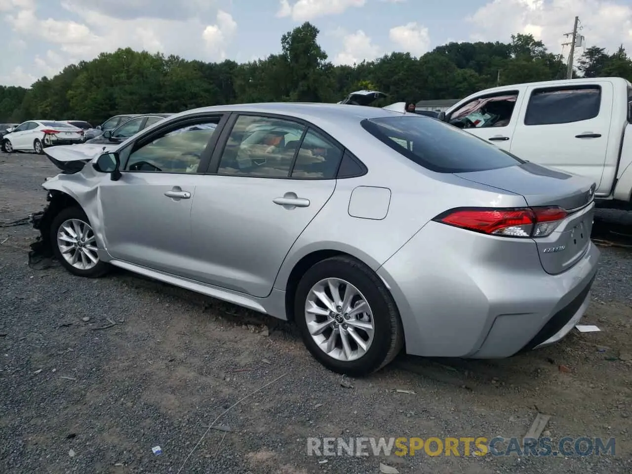 2 fotografías del automóvil dañado JTDVPMAE5N3017577 TOYOTA COROLLA 2022