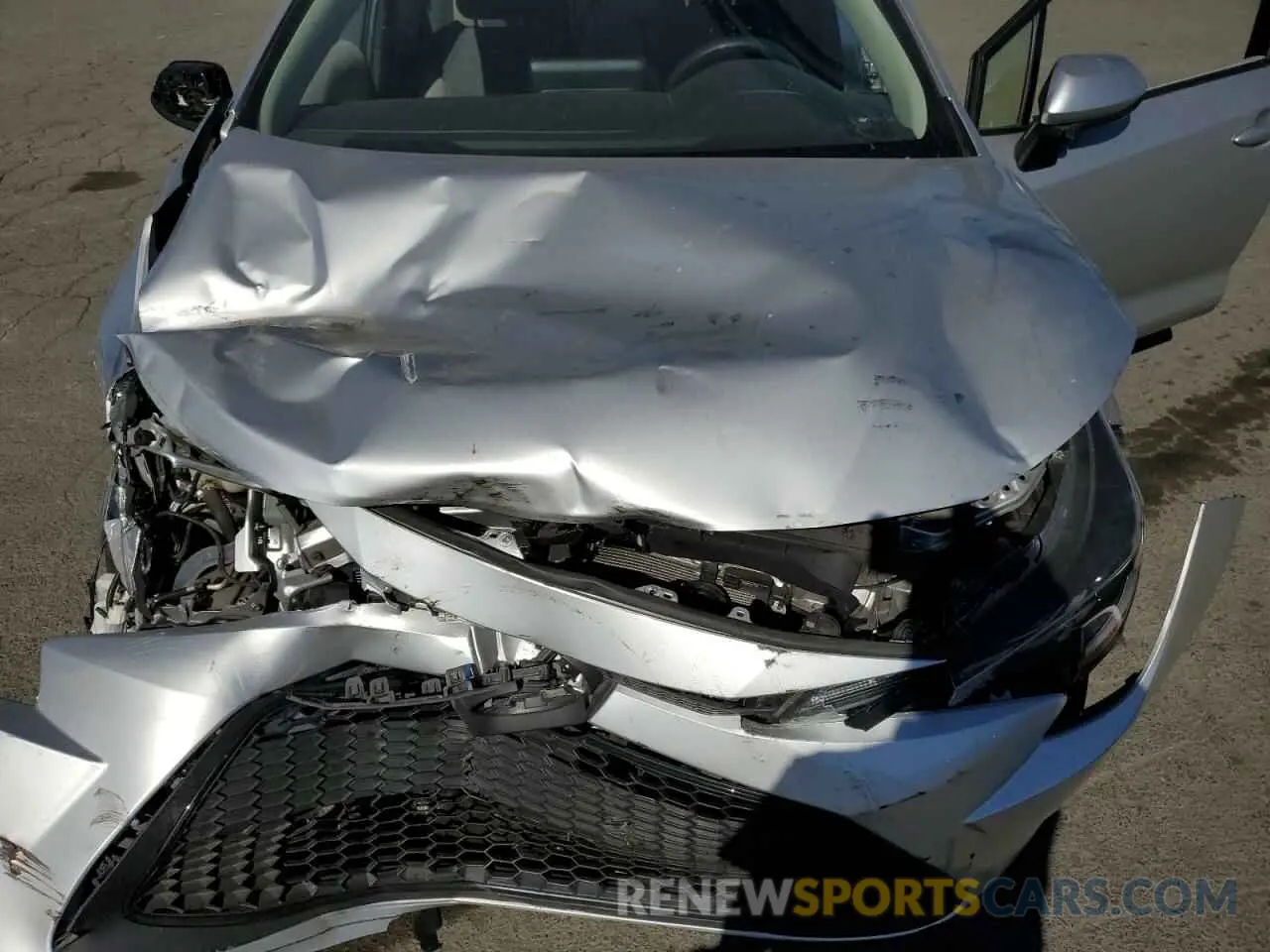 11 fotografías del automóvil dañado JTDVPMAE7NJ205335 TOYOTA COROLLA 2022
