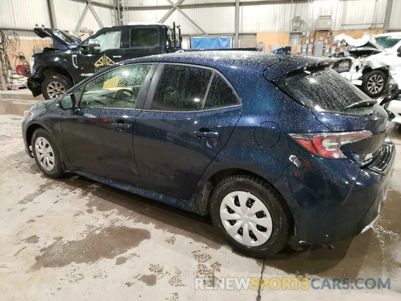 2 fotografías del automóvil dañado JTNK4MBE4N3177651 TOYOTA COROLLA 2022