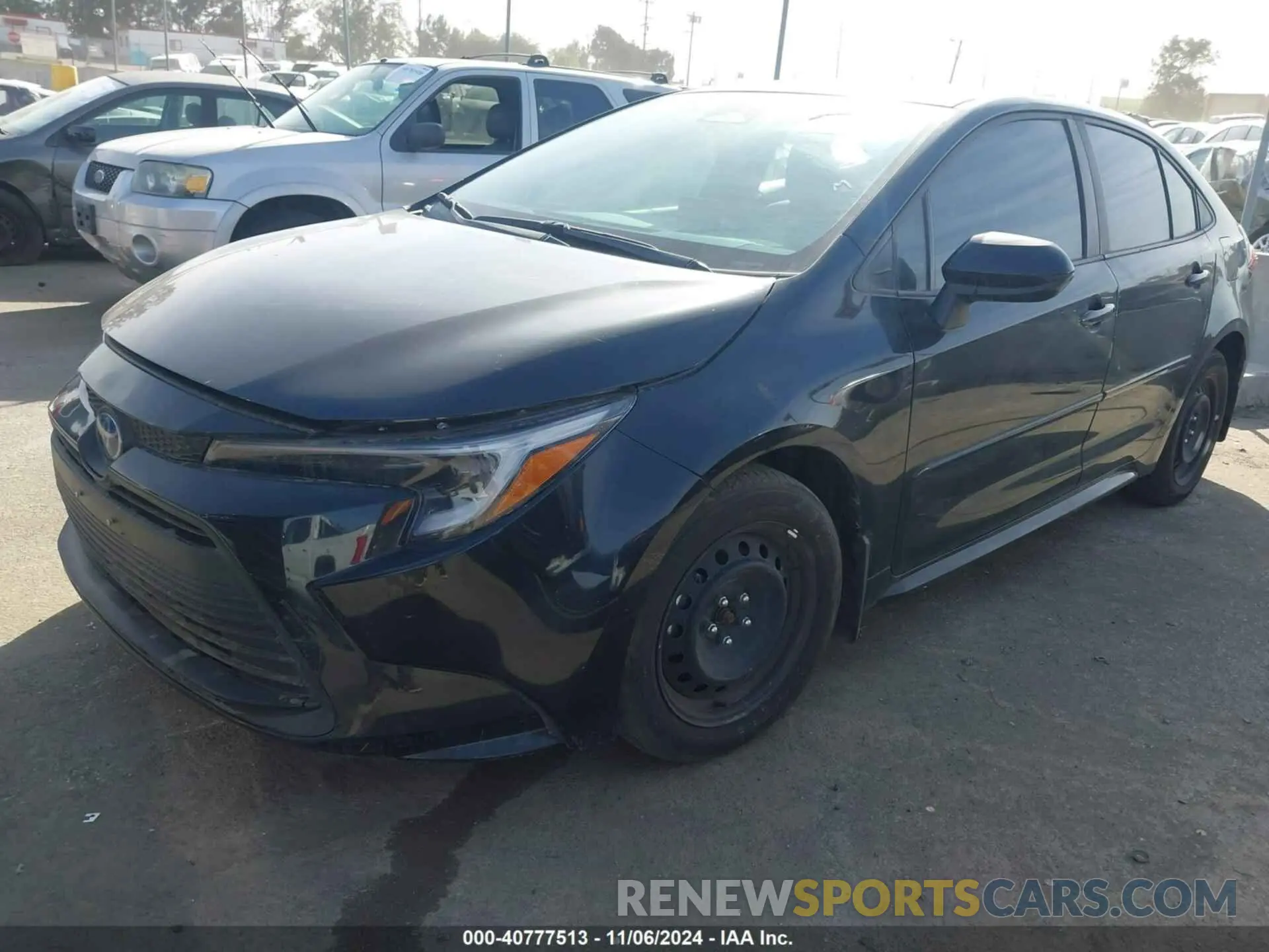 2 fotografías del automóvil dañado JTDBCMFEXP3019061 TOYOTA COROLLA 2023