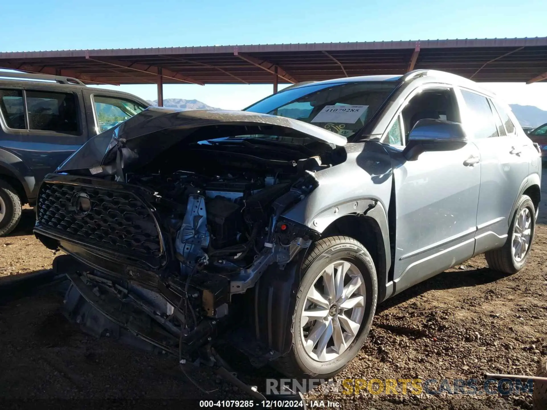 2 fotografías del automóvil dañado 7MUCAAAG4NV034271 TOYOTA COROLLA CROSS 2022
