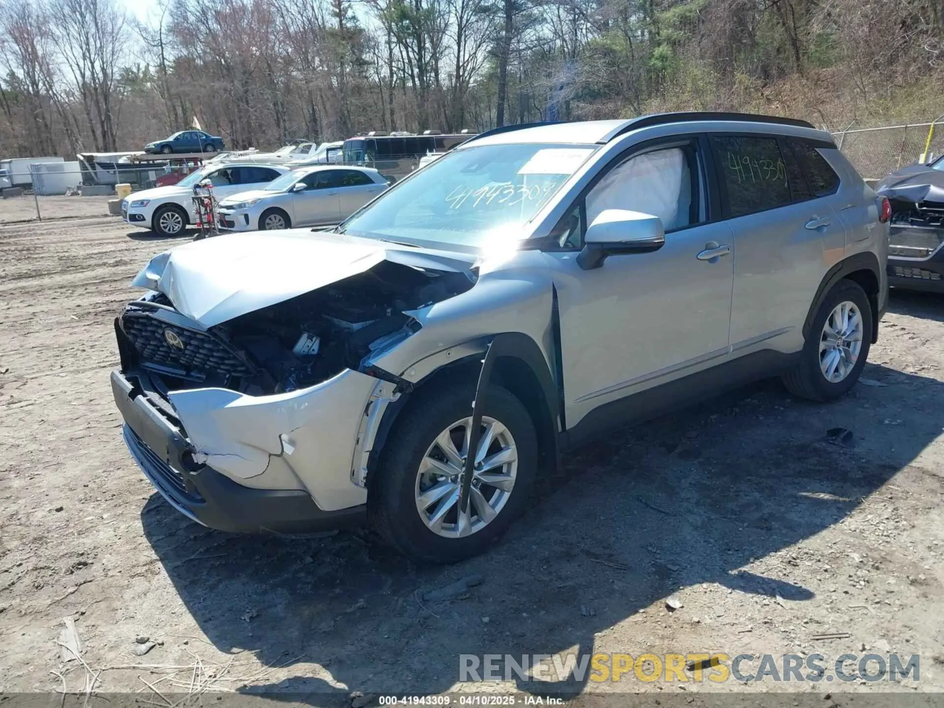2 fotografías del automóvil dañado 7MUCAABG5NV021933 TOYOTA COROLLA CROSS 2022