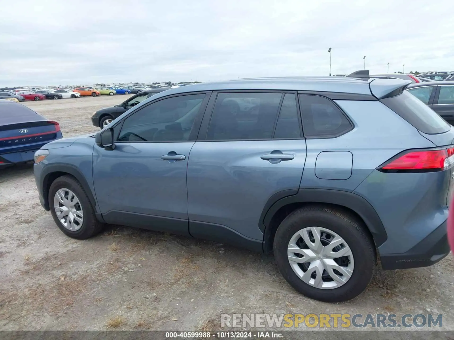 14 fotografías del automóvil dañado 7MUAAAAG0PV054561 TOYOTA COROLLA CROSS 2023