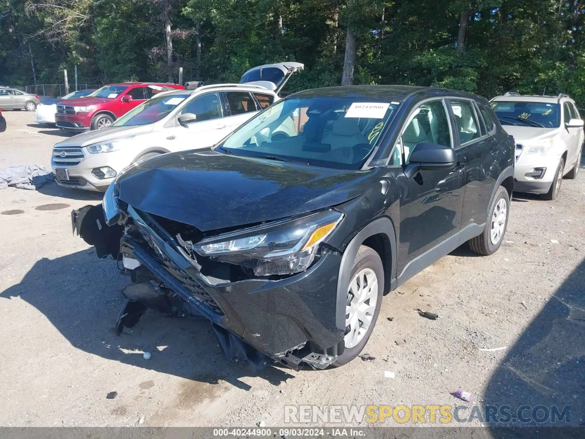 2 fotografías del automóvil dañado 7MUAAAAG2PV049488 TOYOTA COROLLA CROSS 2023