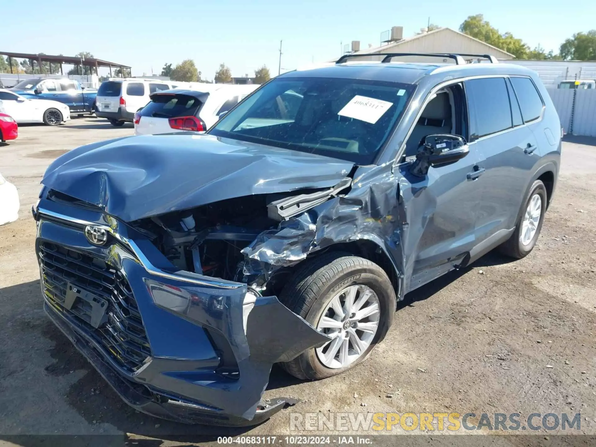 2 fotografías del automóvil dañado 5TDAAAB52RS034354 TOYOTA GRAND HIGHLANDER 2024