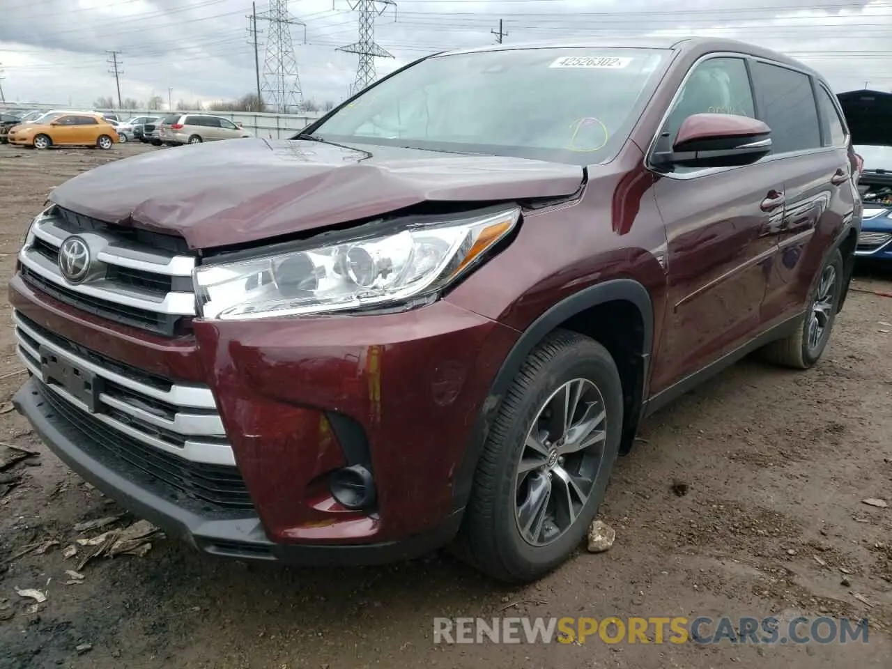 2 fotografías del automóvil dañado 5TDBZRFH1KS715353 TOYOTA HIGHLANDER 2019