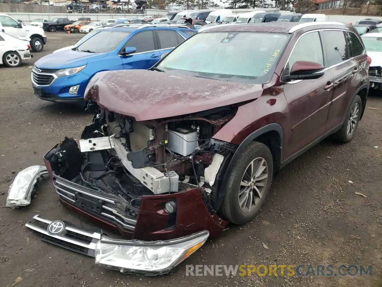 2 fotografías del automóvil dañado 5TDJZRFH1KS981581 TOYOTA HIGHLANDER 2019