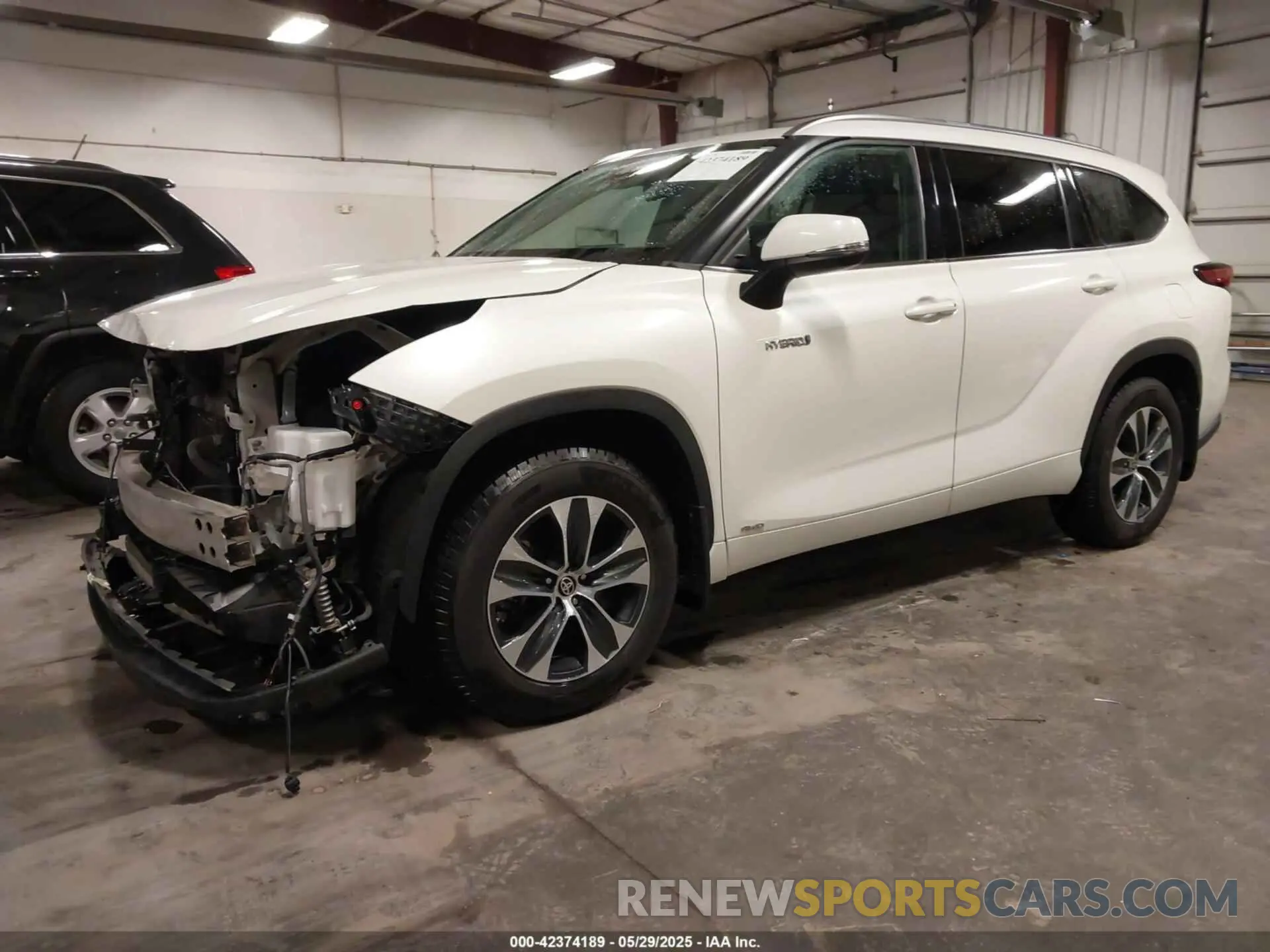 2 fotografías del automóvil dañado 5TDHBRCH2MS515572 TOYOTA HIGHLANDER 2021