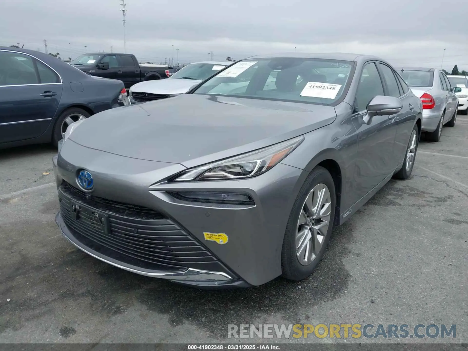 2 fotografías del automóvil dañado JTDAAAAA0NA004985 TOYOTA MIRAI 2022