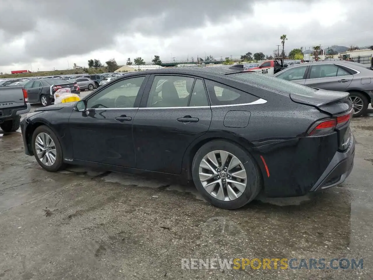 2 fotografías del automóvil dañado JTDAAAAA0NA007059 TOYOTA MIRAI LE 2022