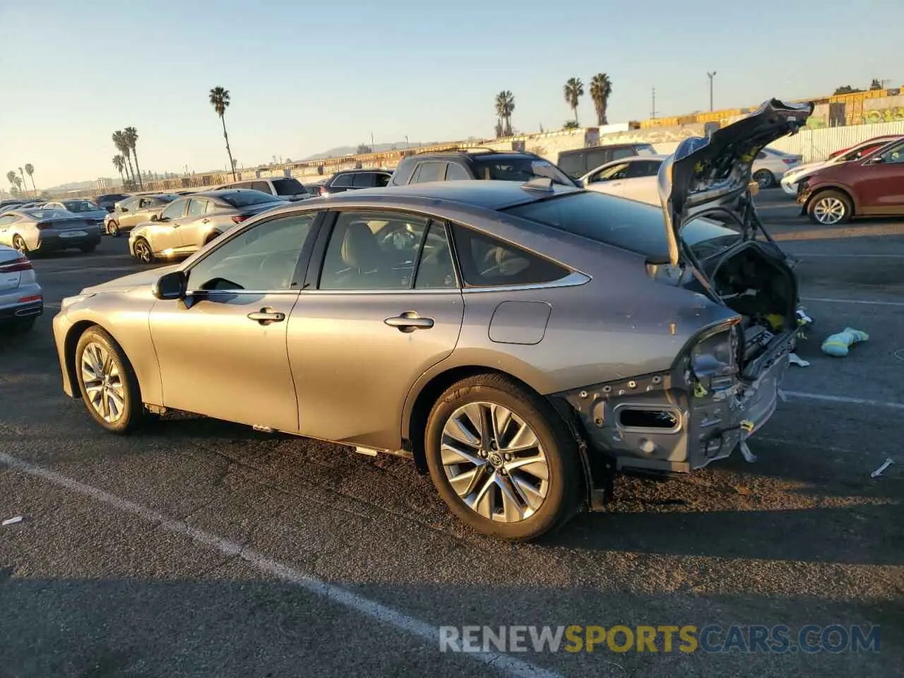 2 fotografías del automóvil dañado JTDAAAAA3NA006357 TOYOTA MIRAI LE 2022