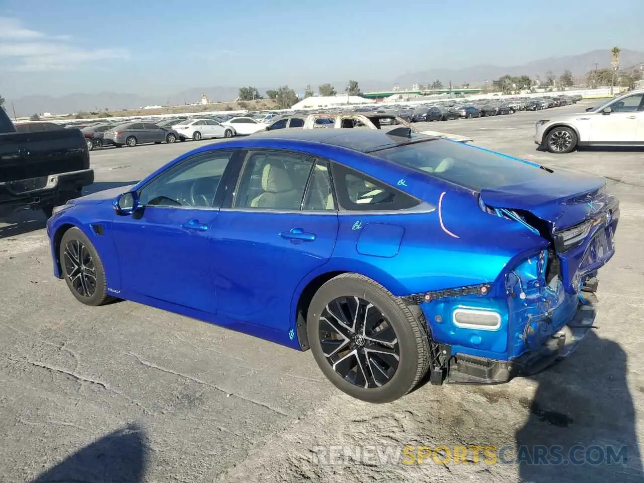 2 fotografías del automóvil dañado JTDAAAAA8NA004538 TOYOTA MIRAI LE 2022