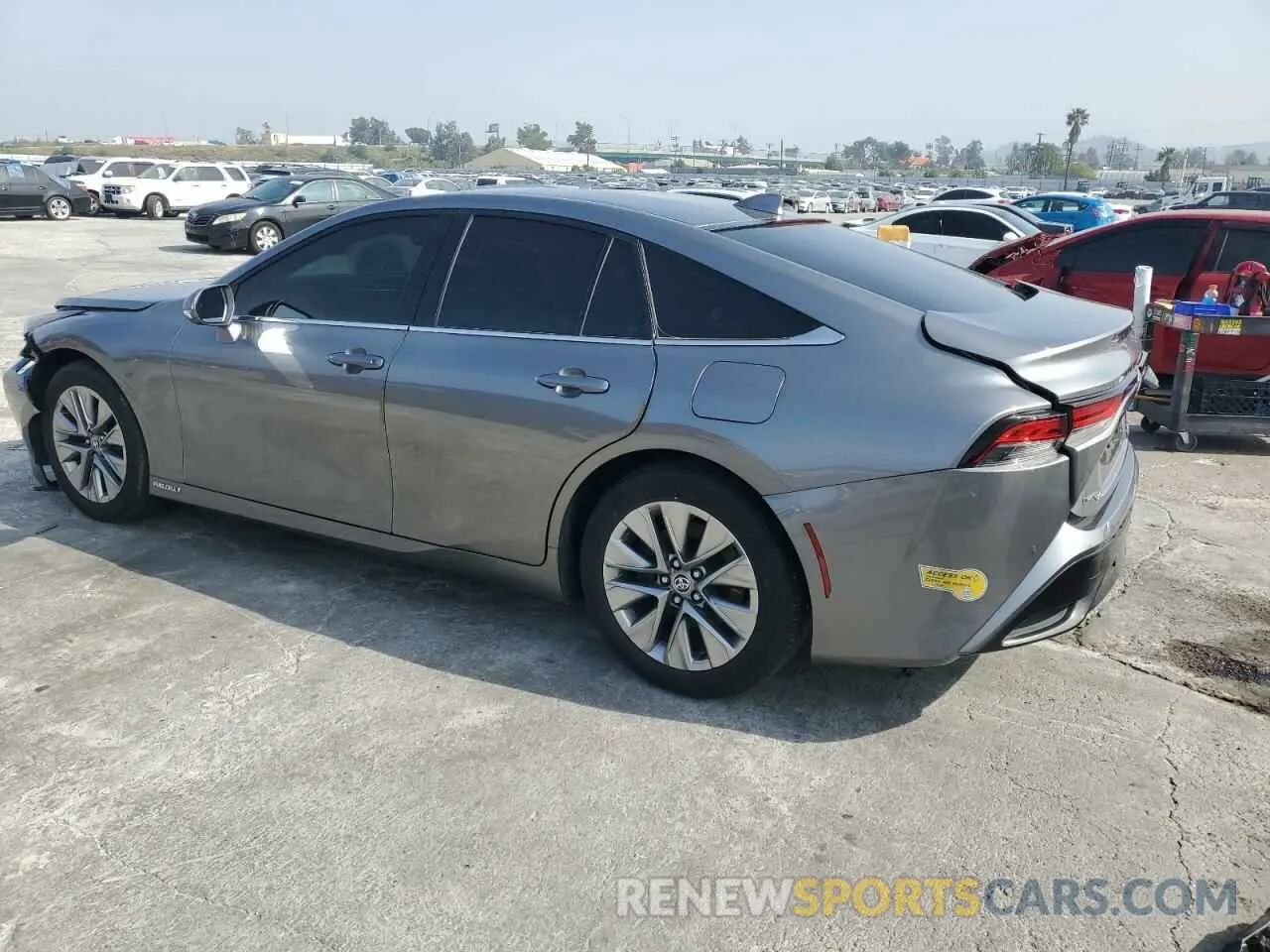 2 fotografías del automóvil dañado JTDAAAAA9NA006217 TOYOTA MIRAI LE 2022