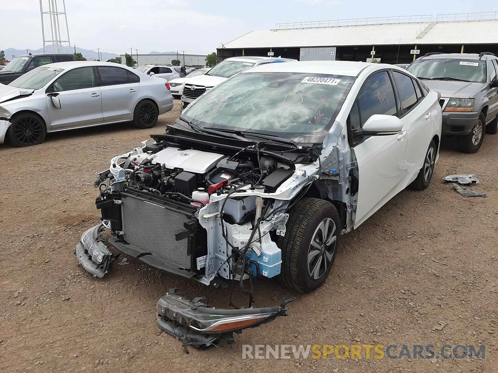 2 fotografías del automóvil dañado JTDKARFPXK3110103 TOYOTA PRIUS 2019