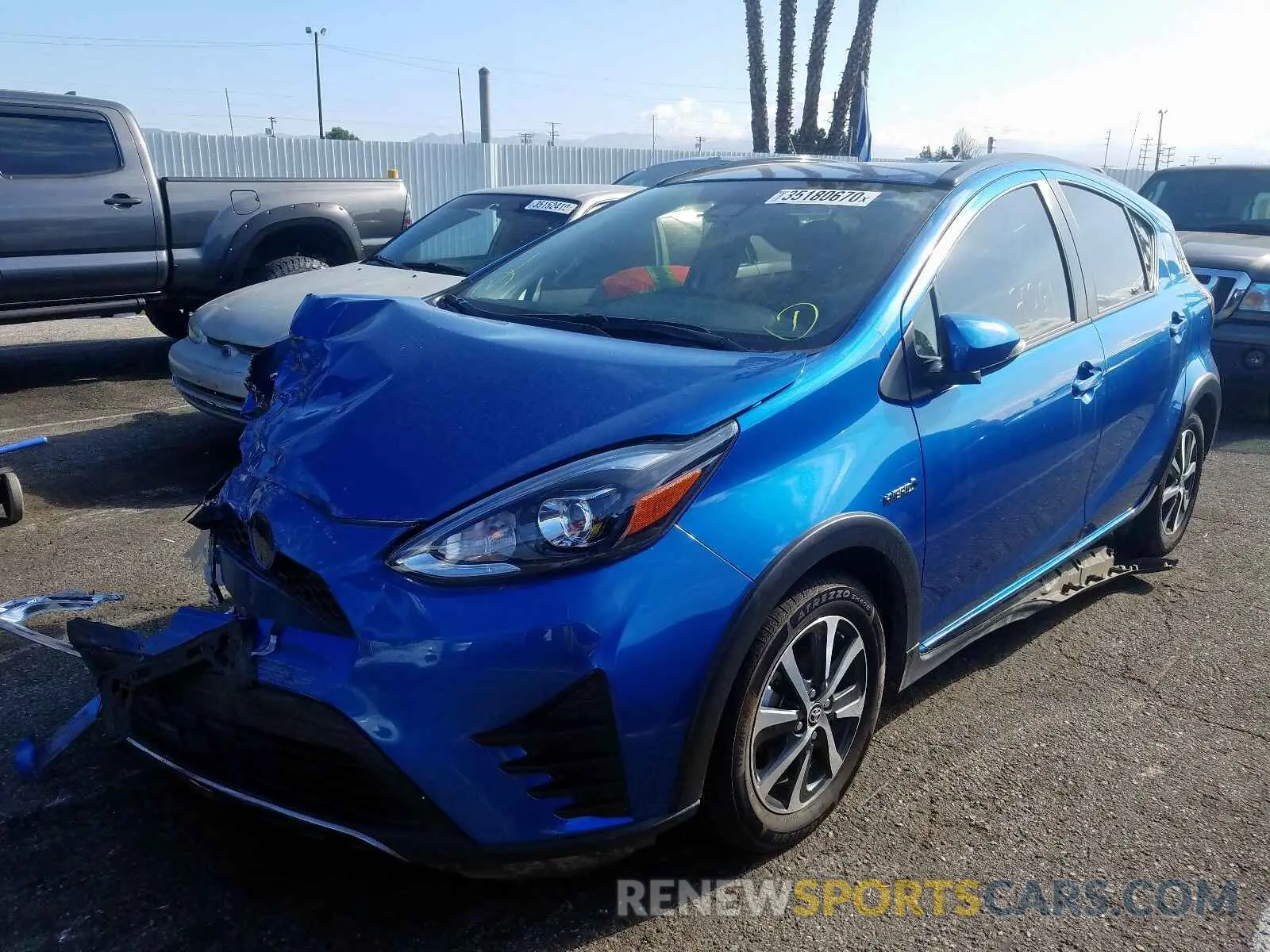 2 fotografías del automóvil dañado JTDKDTB38K1622915 TOYOTA PRIUS 2019
