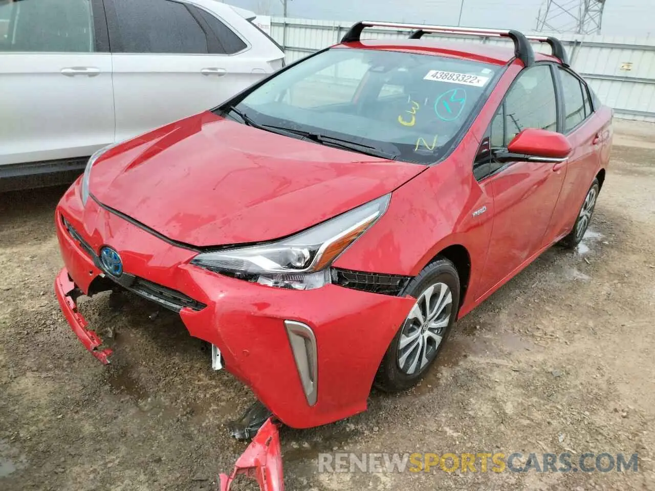 2 fotografías del automóvil dañado JTDL9RFU0K3010630 TOYOTA PRIUS 2019