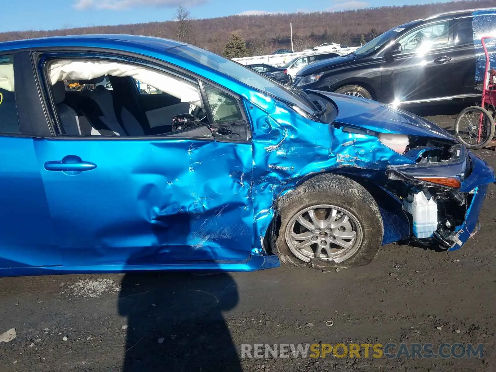 9 fotografías del automóvil dañado JTDL9RFU3K3006460 TOYOTA PRIUS 2019