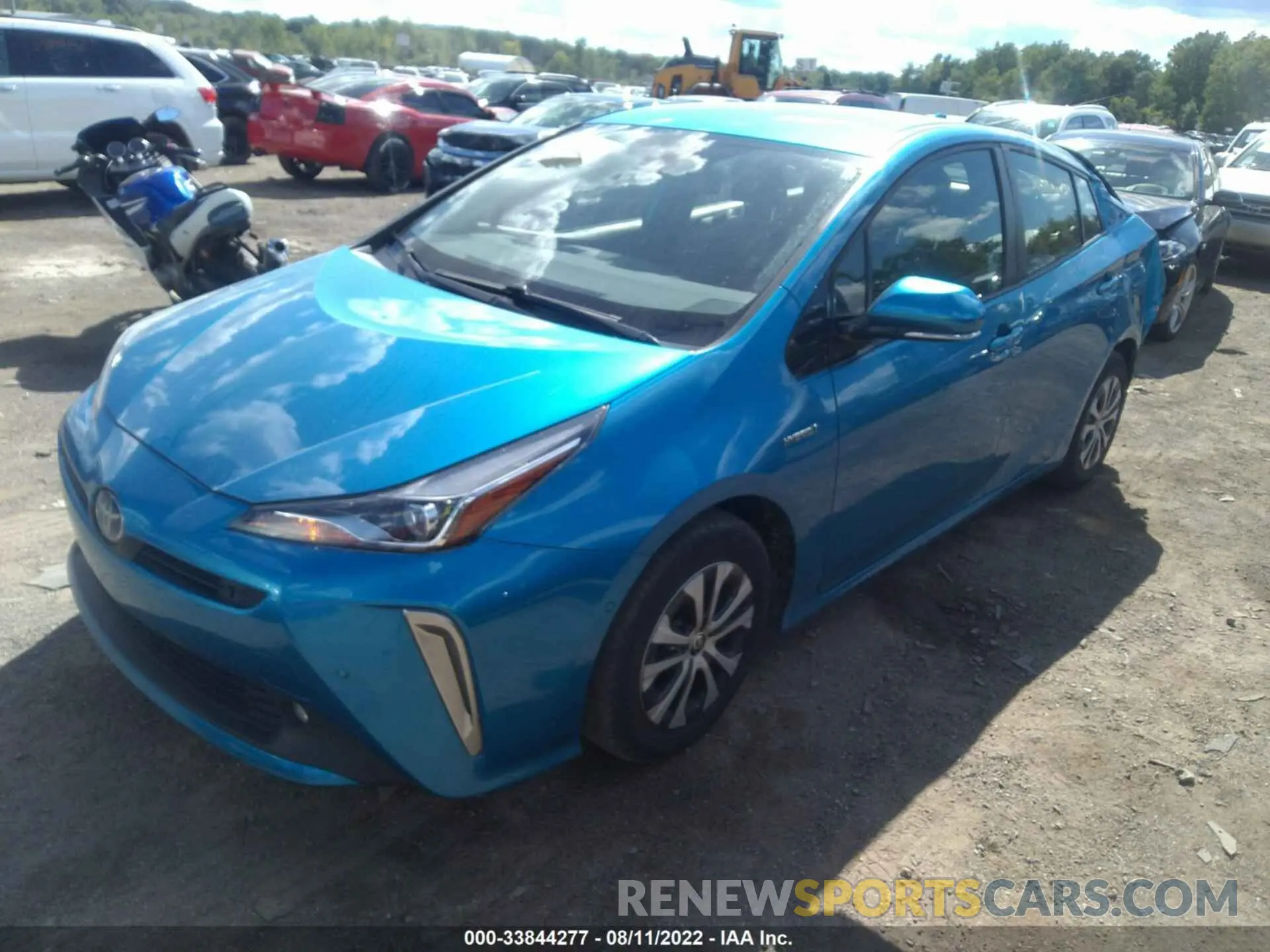 2 fotografías del automóvil dañado JTDL9RFU4K3008170 TOYOTA PRIUS 2019