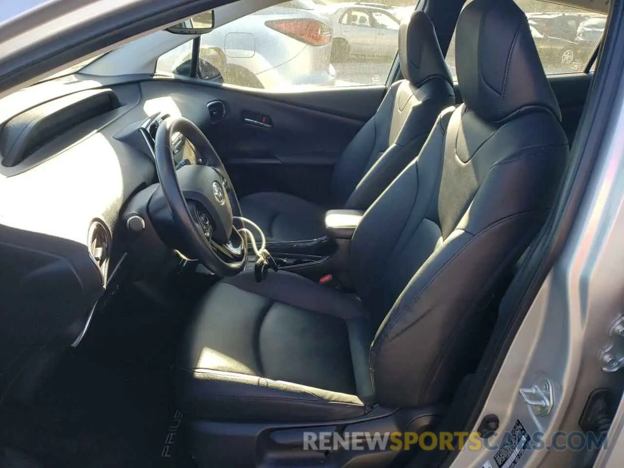 7 fotografías del automóvil dañado JTDL9RFU4K3011652 TOYOTA PRIUS 2019