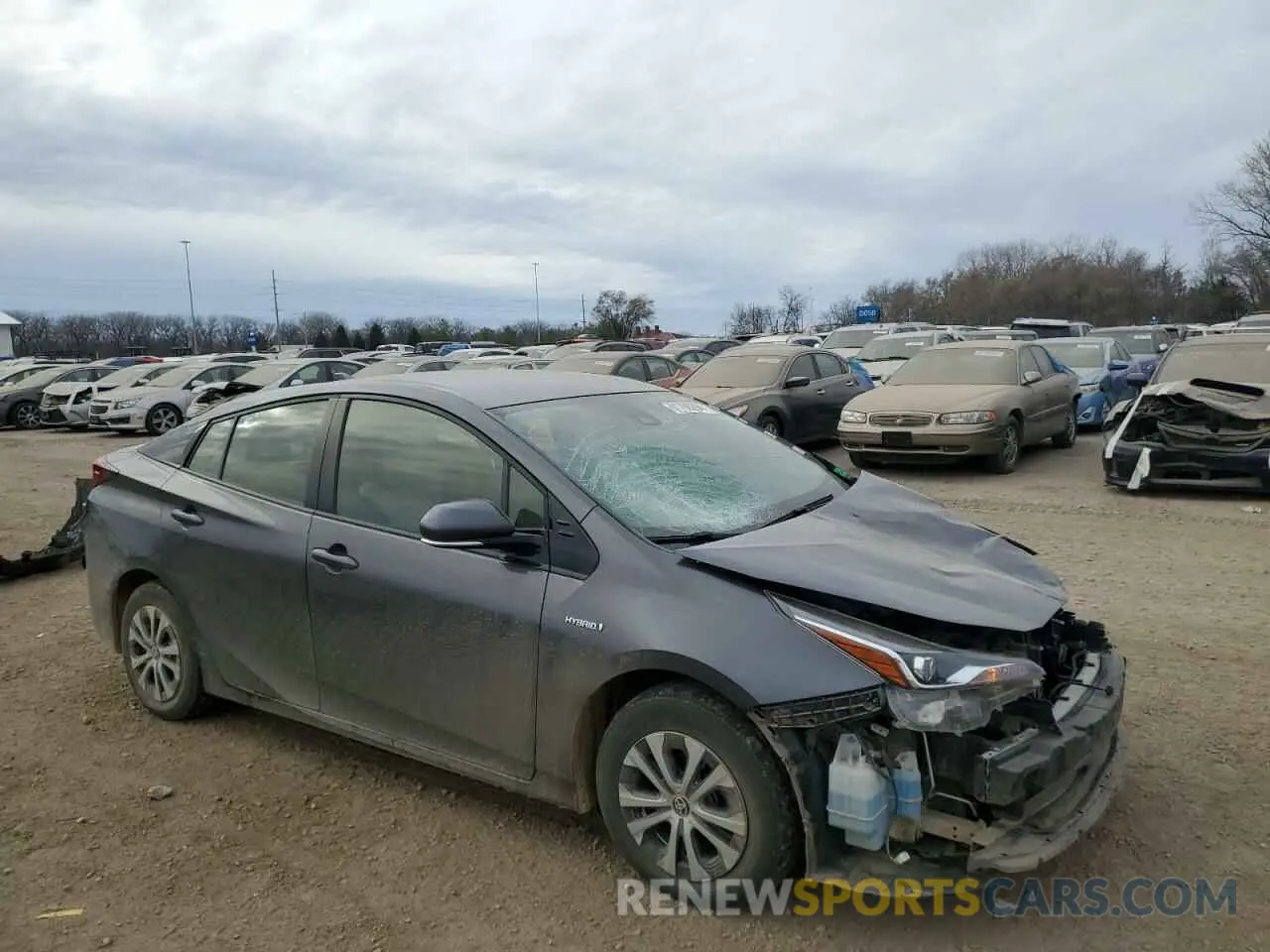 4 fotografías del automóvil dañado JTDL9RFU6K3008722 TOYOTA PRIUS 2019