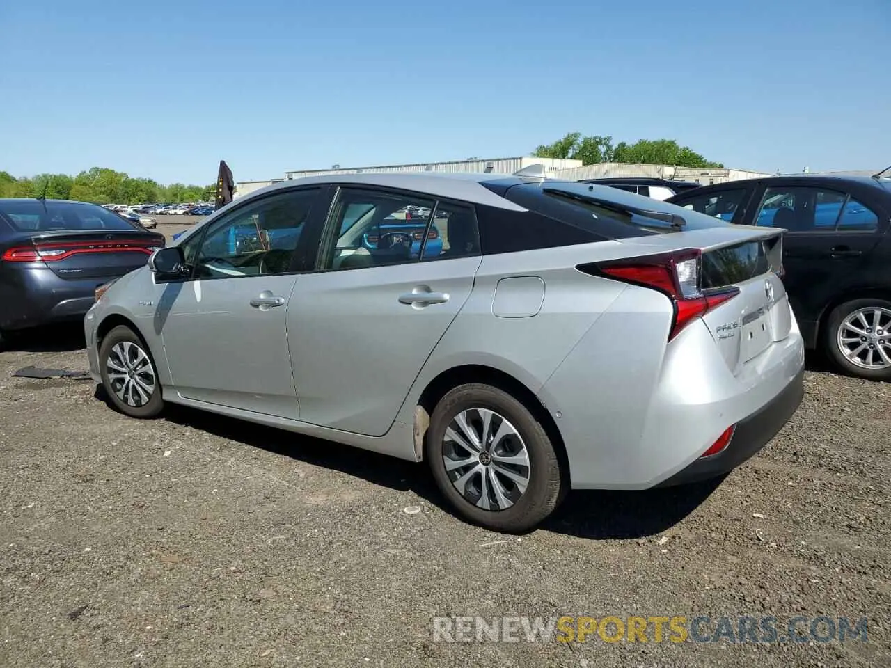 2 fotografías del automóvil dañado JTDL9RFU7K3002024 TOYOTA PRIUS 2019