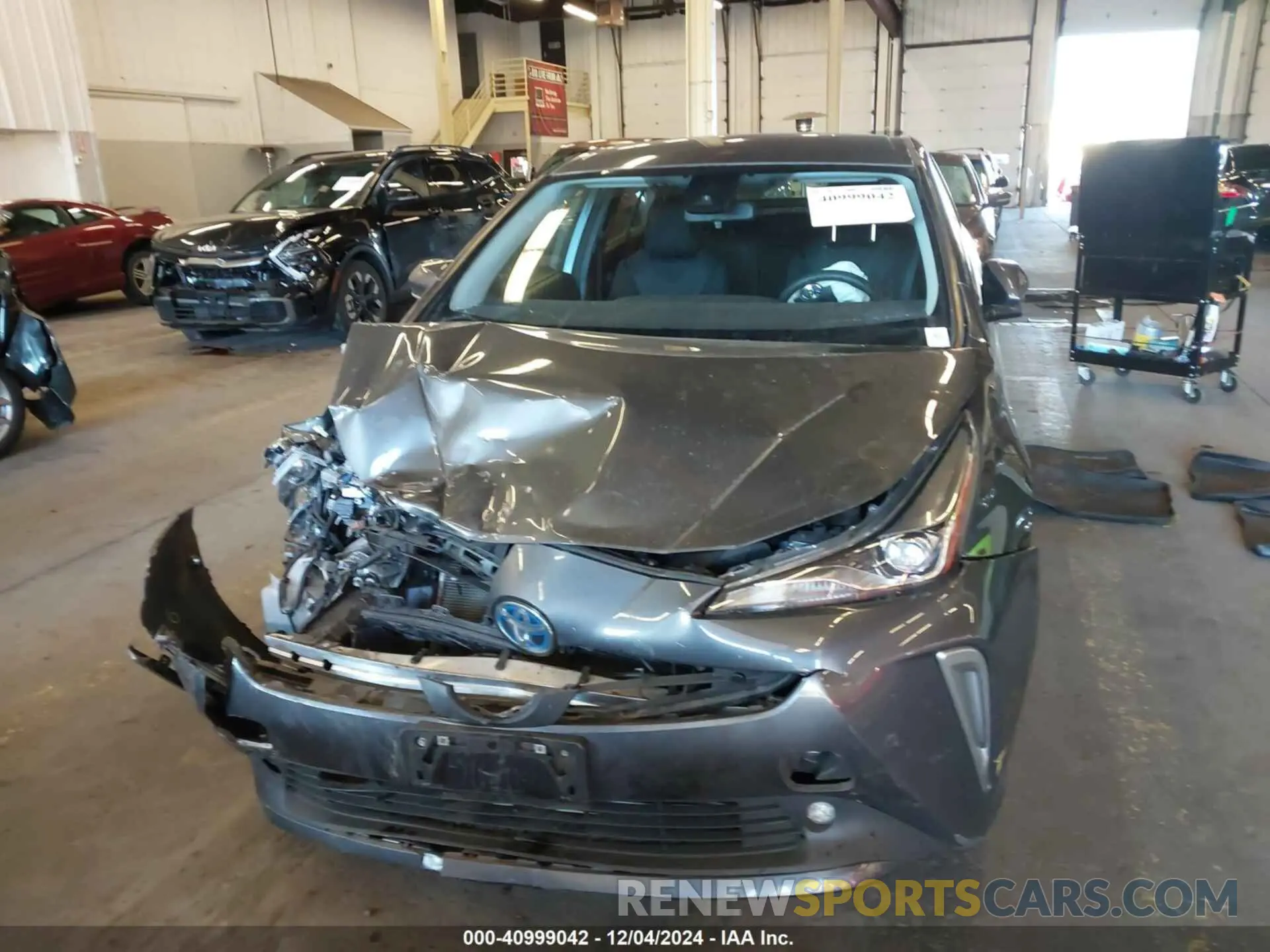 11 fotografías del automóvil dañado JTDL9RFU7K3012956 TOYOTA PRIUS 2019