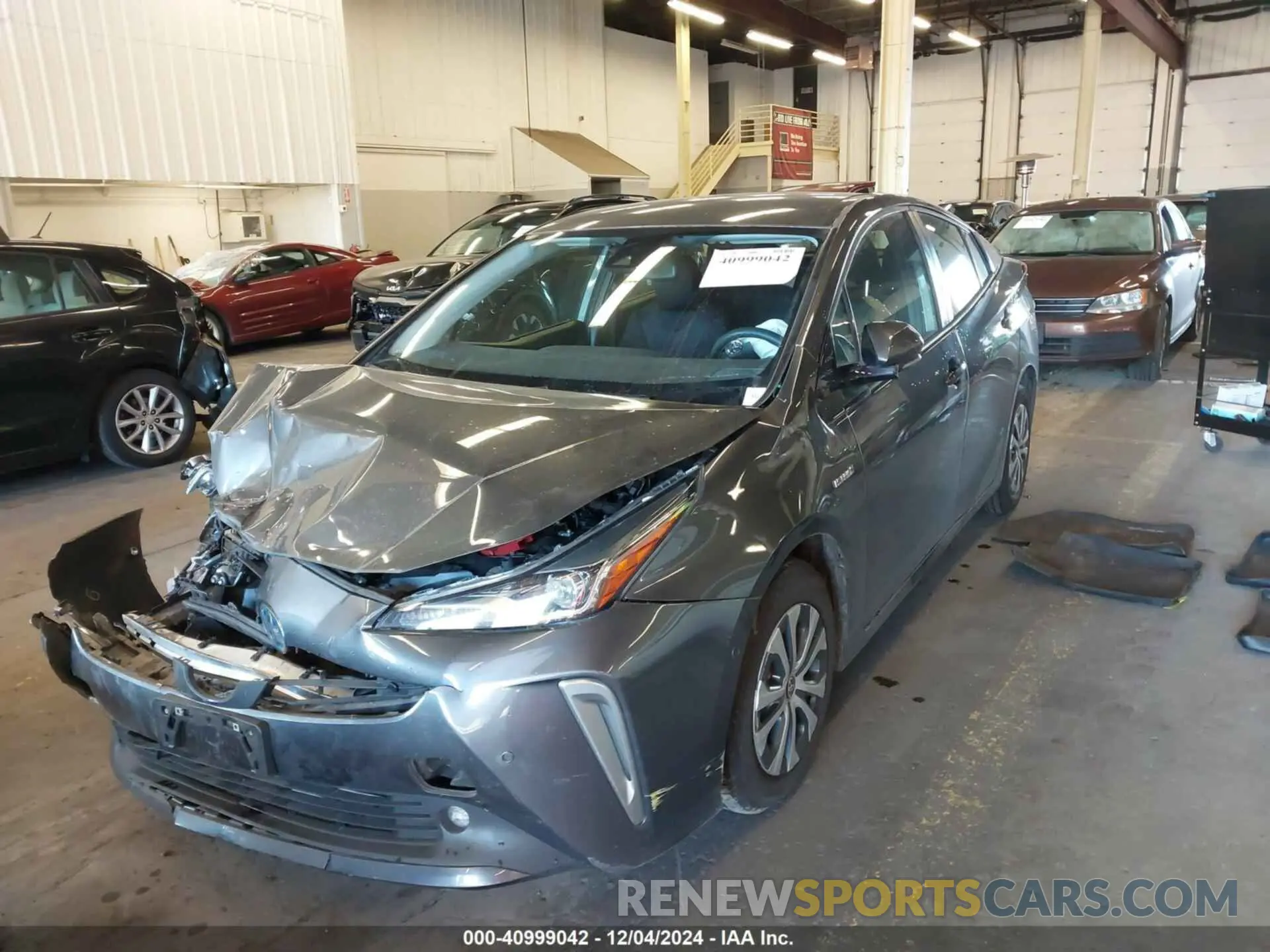 2 fotografías del automóvil dañado JTDL9RFU7K3012956 TOYOTA PRIUS 2019