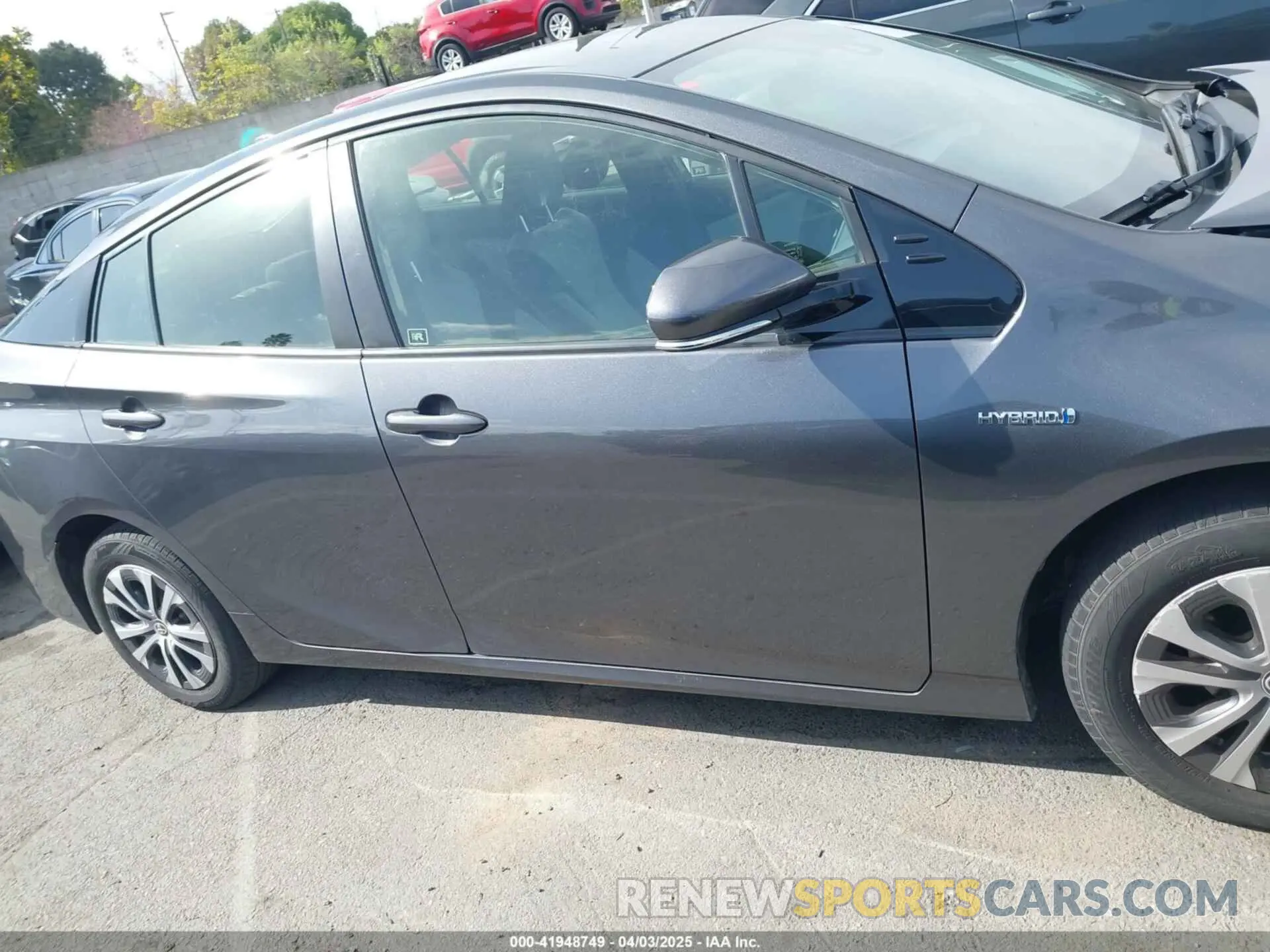 13 fotografías del automóvil dañado JTDL9RFUXK3005094 TOYOTA PRIUS 2019