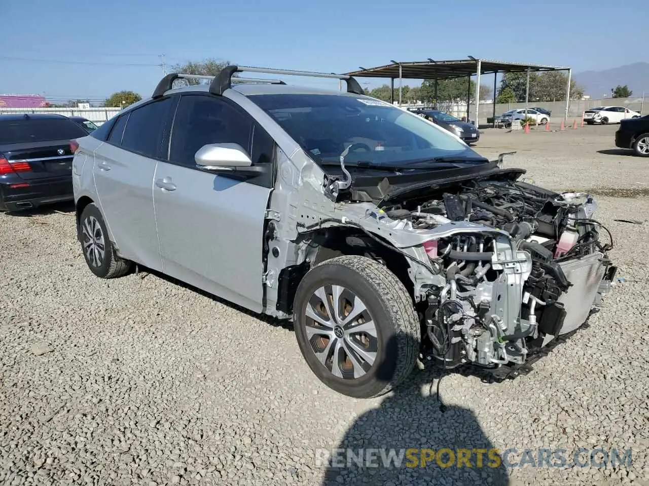 4 fotografías del automóvil dañado JTDKAMFP5M3179965 TOYOTA PRIUS 2021