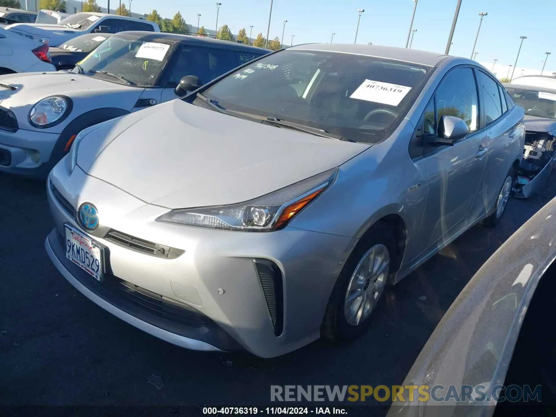 2 fotografías del automóvil dañado JTDKAMFU6M3131672 TOYOTA PRIUS 2021