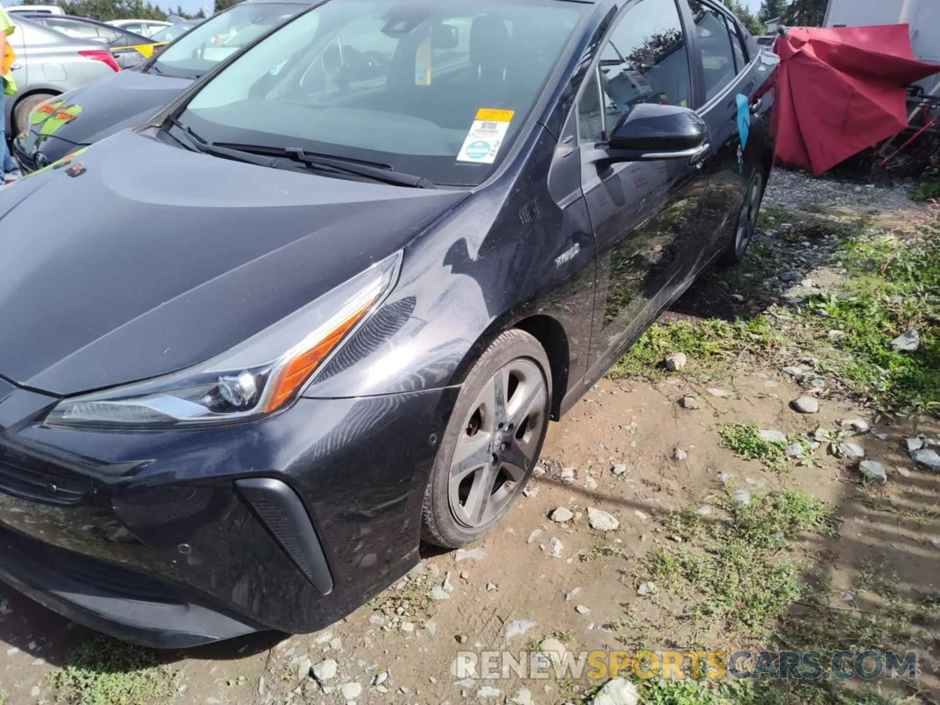 25 fotografías del automóvil dañado JTDKAMFU7M3136329 TOYOTA PRIUS 2021