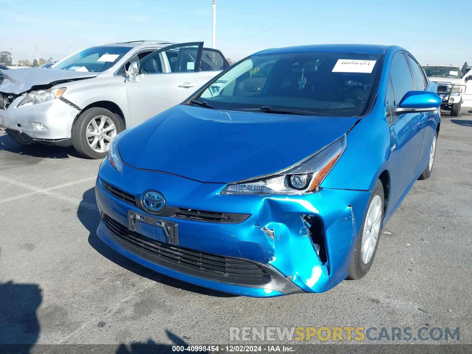 2 fotografías del automóvil dañado JTDKAMFUXM3134462 TOYOTA PRIUS 2021