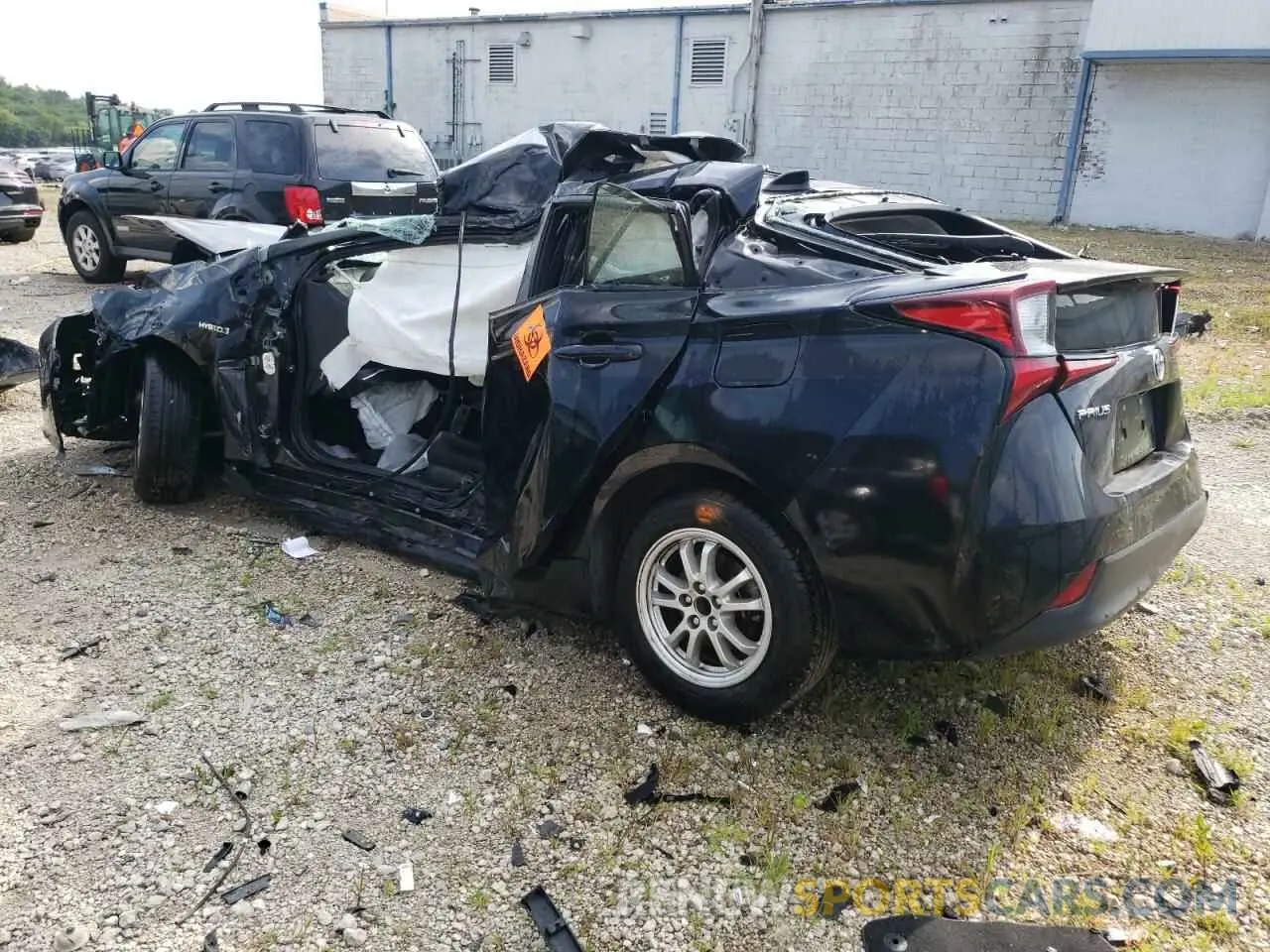 2 fotografías del automóvil dañado JTDKAMFUXM3148958 TOYOTA PRIUS 2021