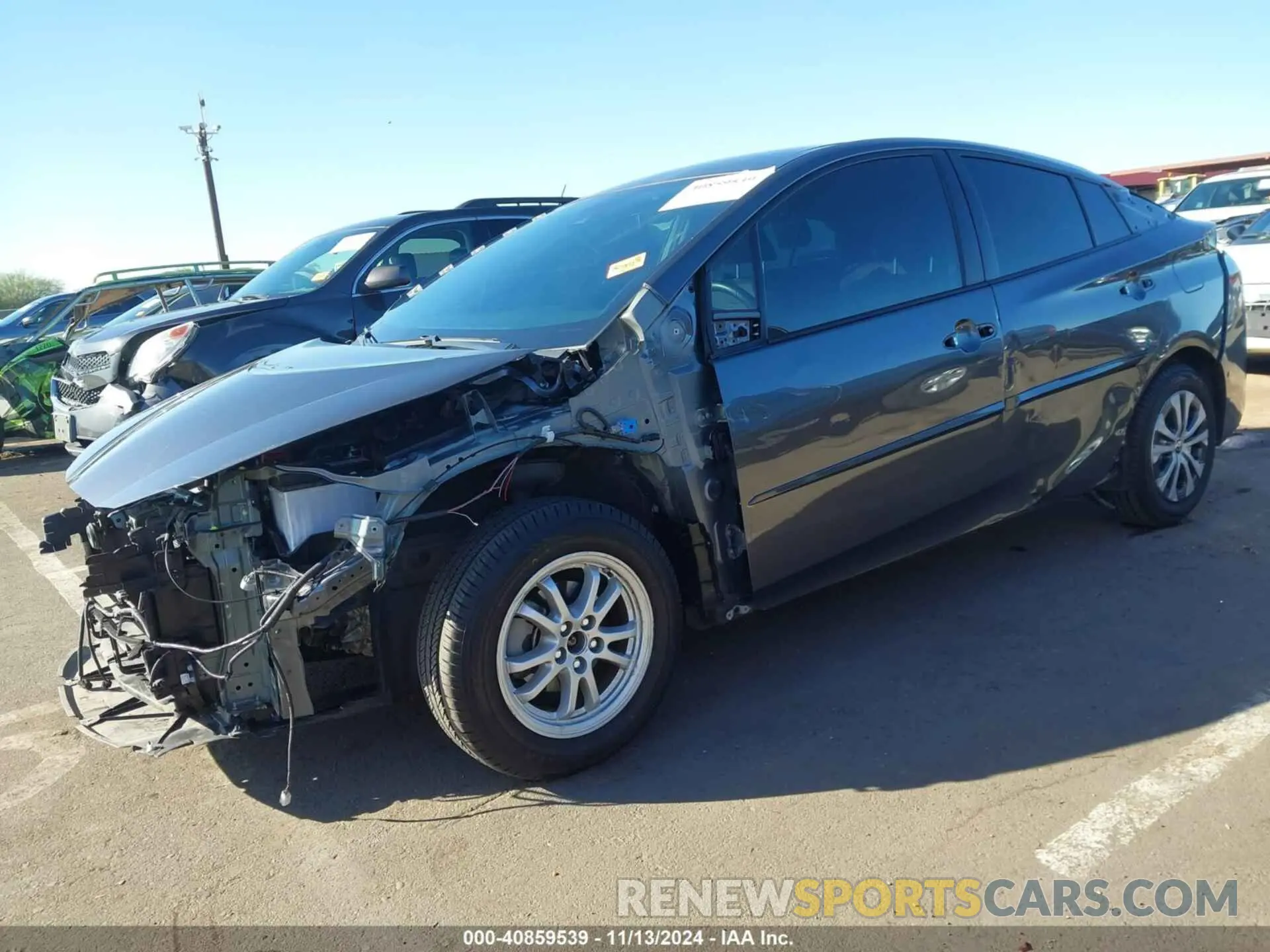 2 fotografías del automóvil dañado JTDL9MFU1M3022890 TOYOTA PRIUS 2021