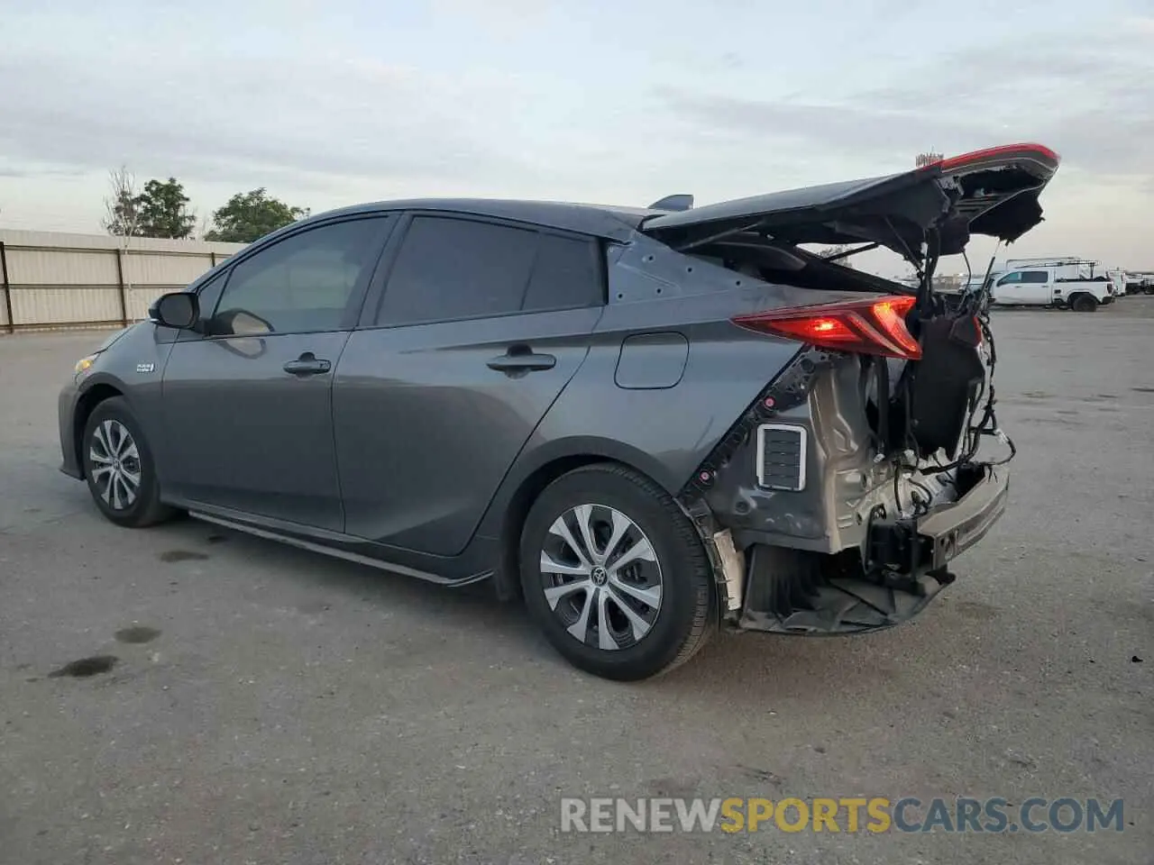 2 fotografías del automóvil dañado JTDKAMFP0N3228104 TOYOTA PRIUS 2022