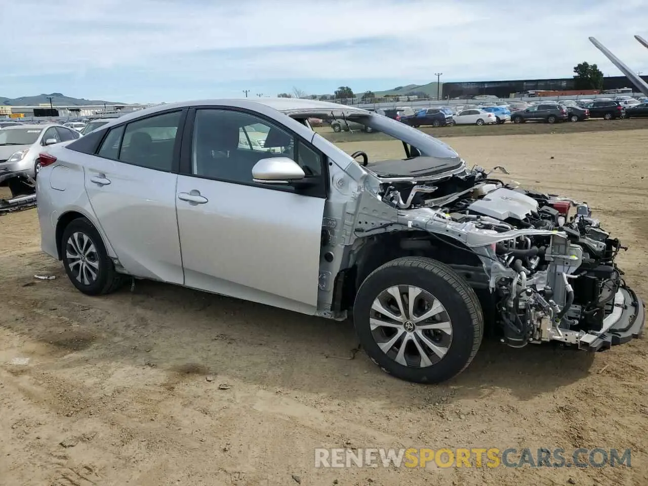 4 fotografías del automóvil dañado JTDKAMFP2N3223311 TOYOTA PRIUS 2022