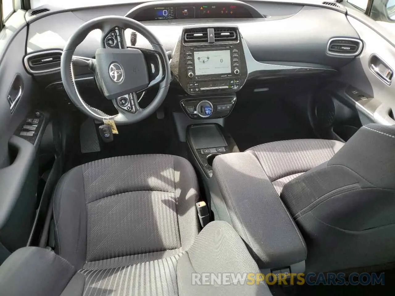 8 fotografías del automóvil dañado JTDKAMFP2N3223311 TOYOTA PRIUS 2022