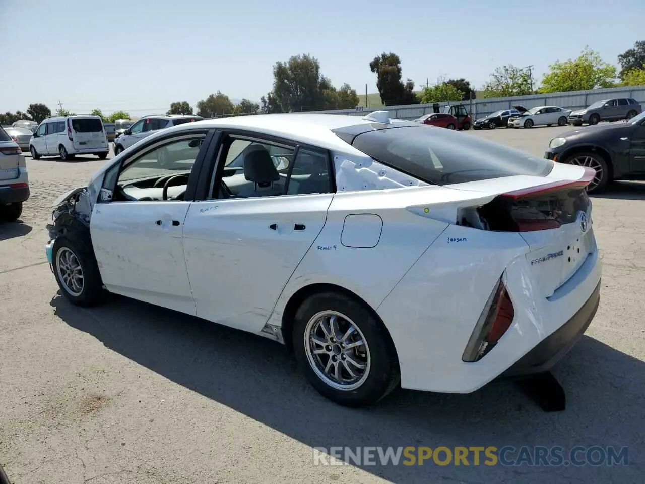 2 fotografías del automóvil dañado JTDKAMFP4N3210219 TOYOTA PRIUS 2022