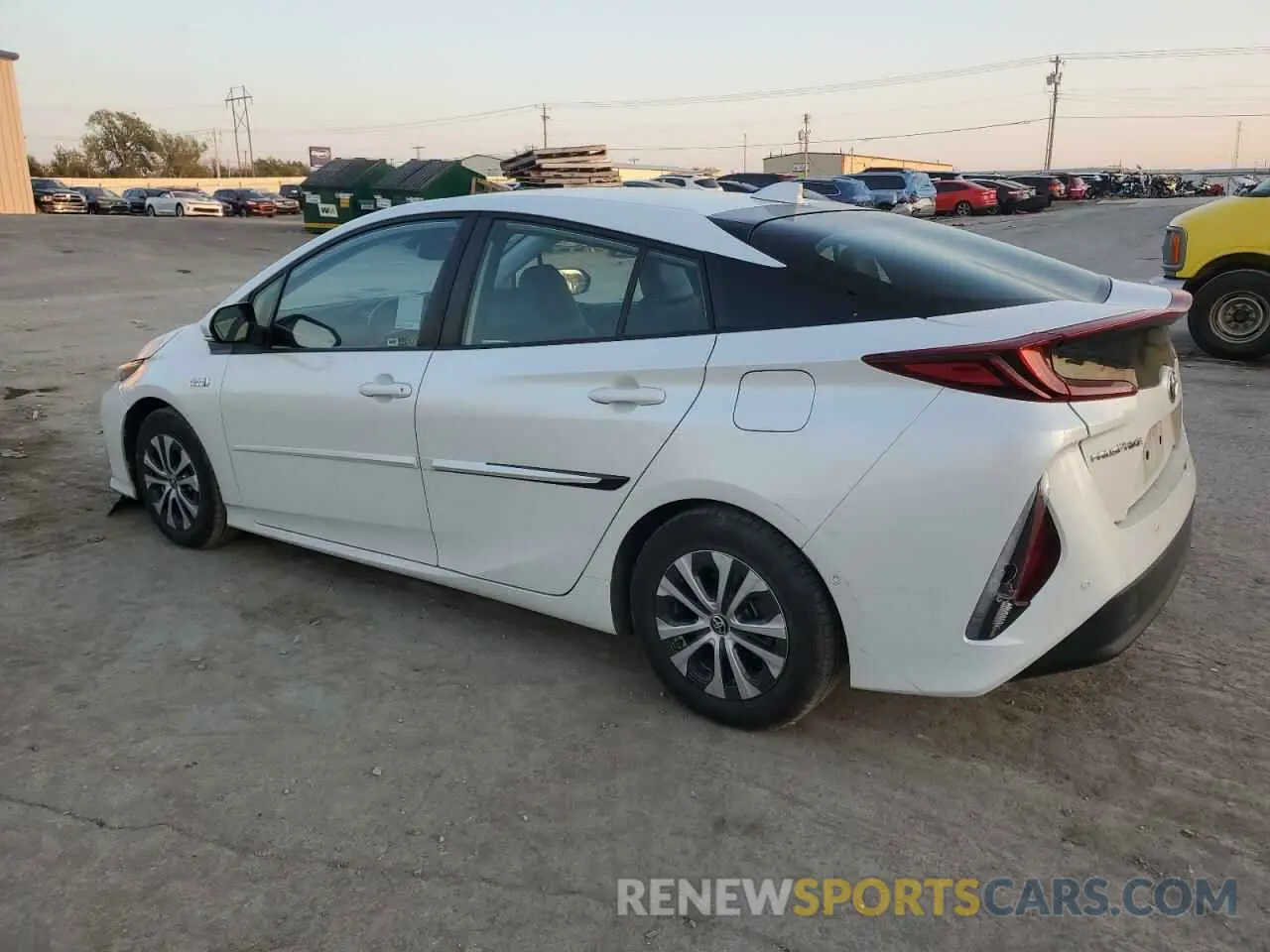 2 fotografías del automóvil dañado JTDKAMFPXN3199680 TOYOTA PRIUS 2022