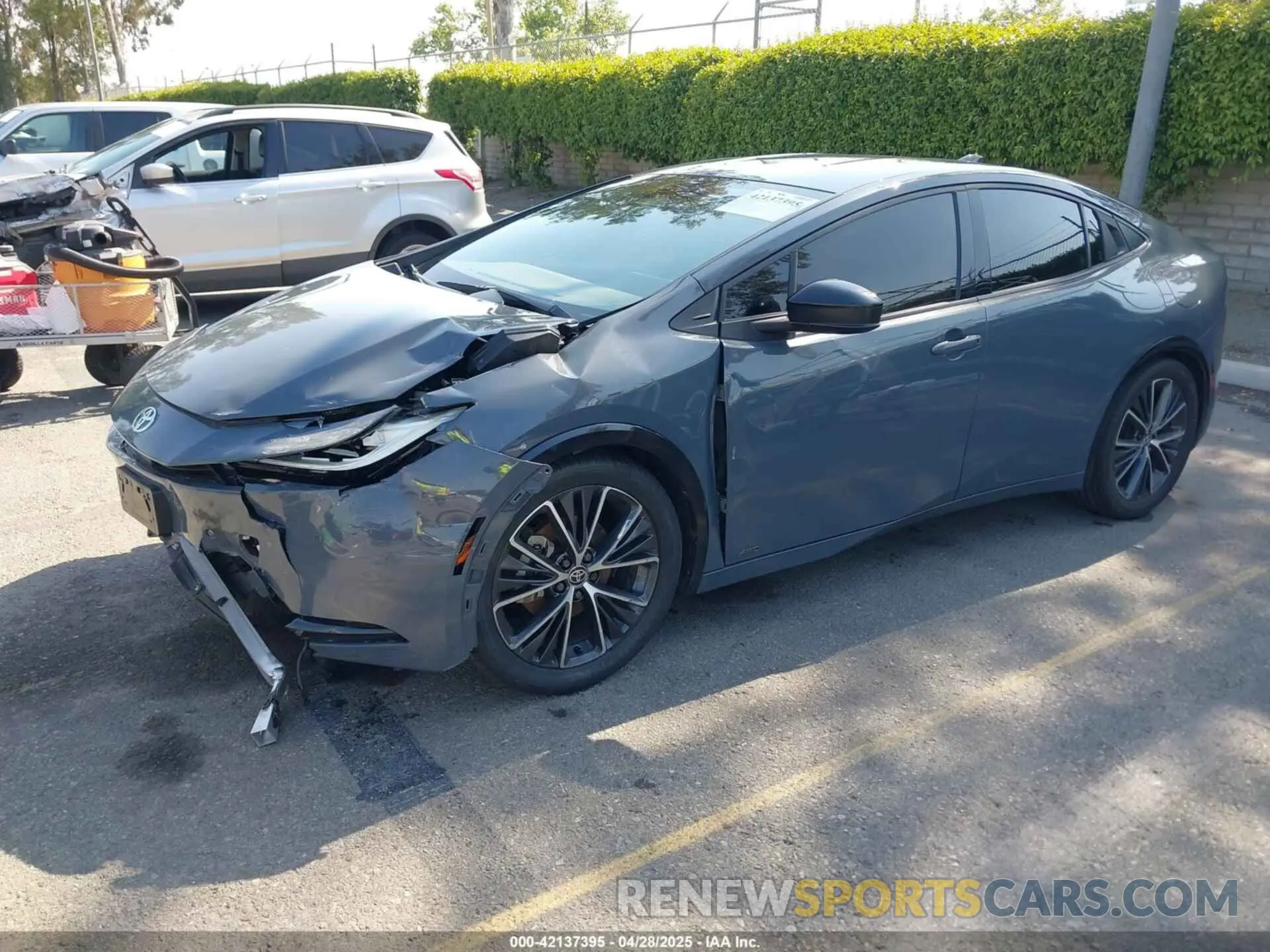 2 fotografías del automóvil dañado JTDADABU6P3001399 TOYOTA PRIUS 2023