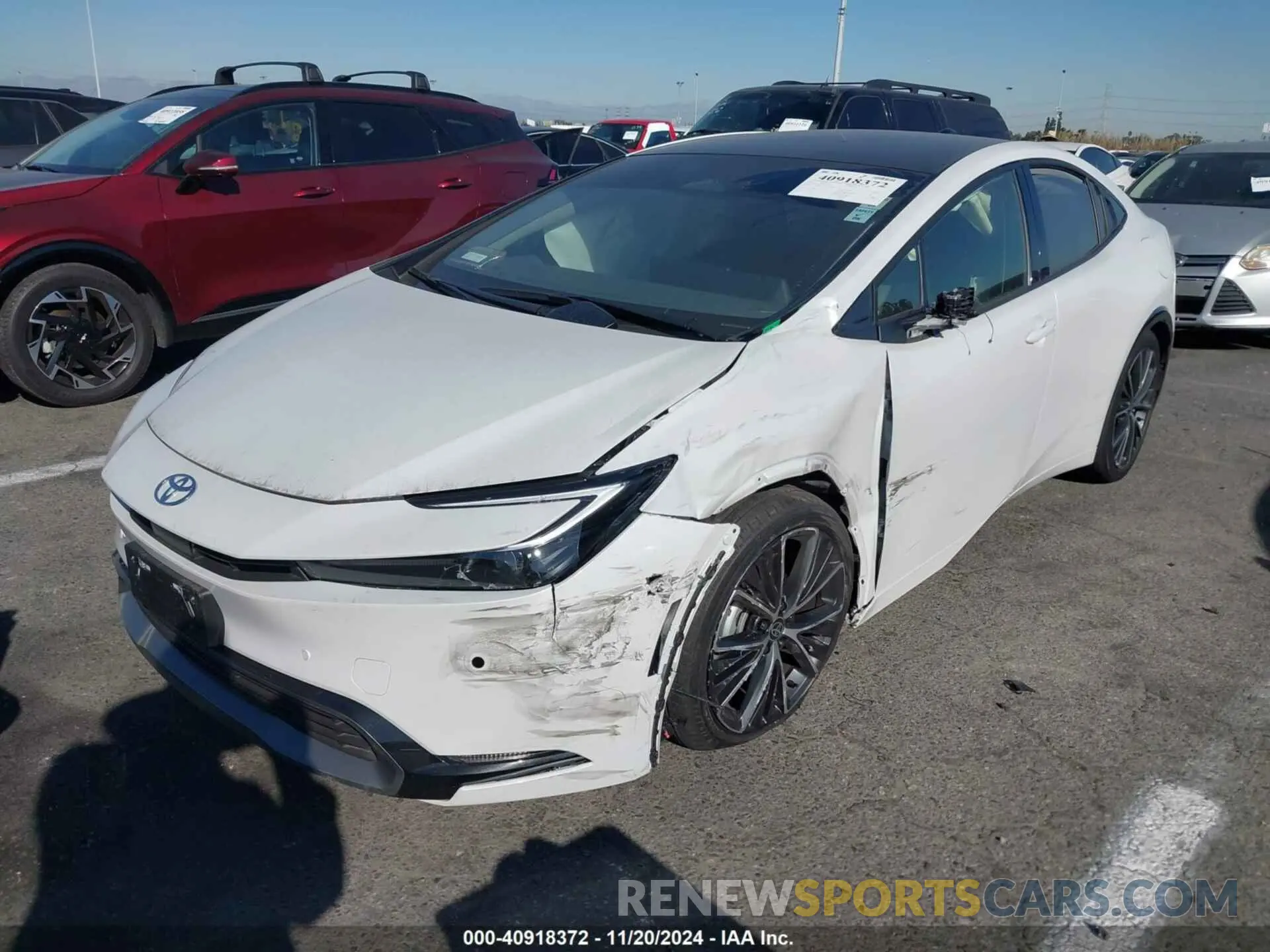 2 fotografías del automóvil dañado JTDACAAU7R3022463 TOYOTA PRIUS 2024