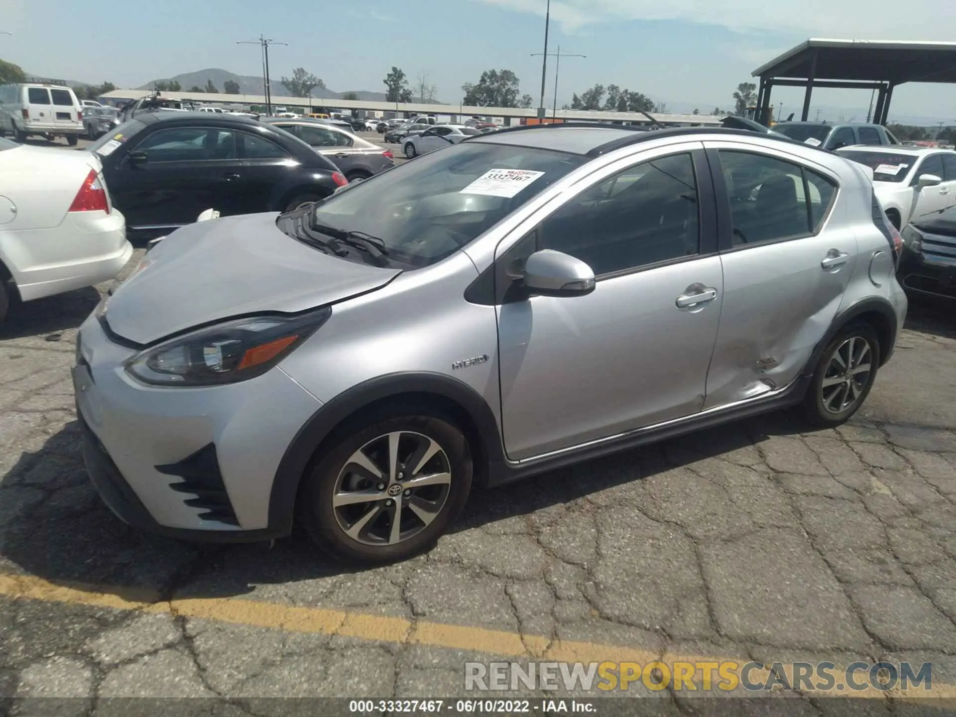 2 fotografías del automóvil dañado JTDKDTB34K1626539 TOYOTA PRIUS C 2019