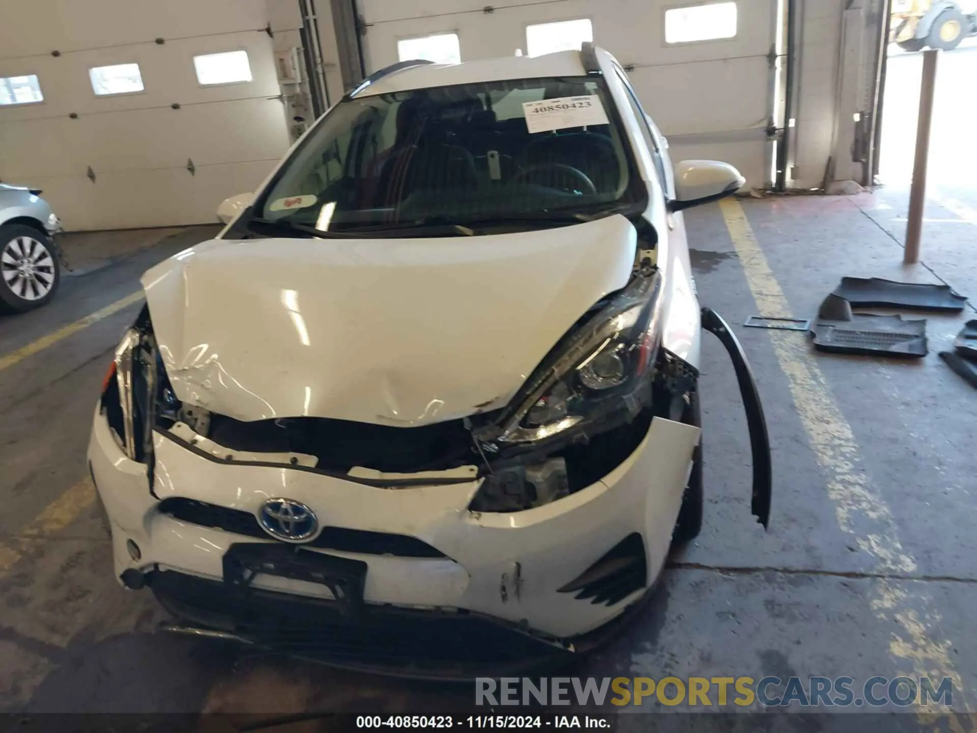 12 fotografías del automóvil dañado JTDKDTB35K1624041 TOYOTA PRIUS C 2019