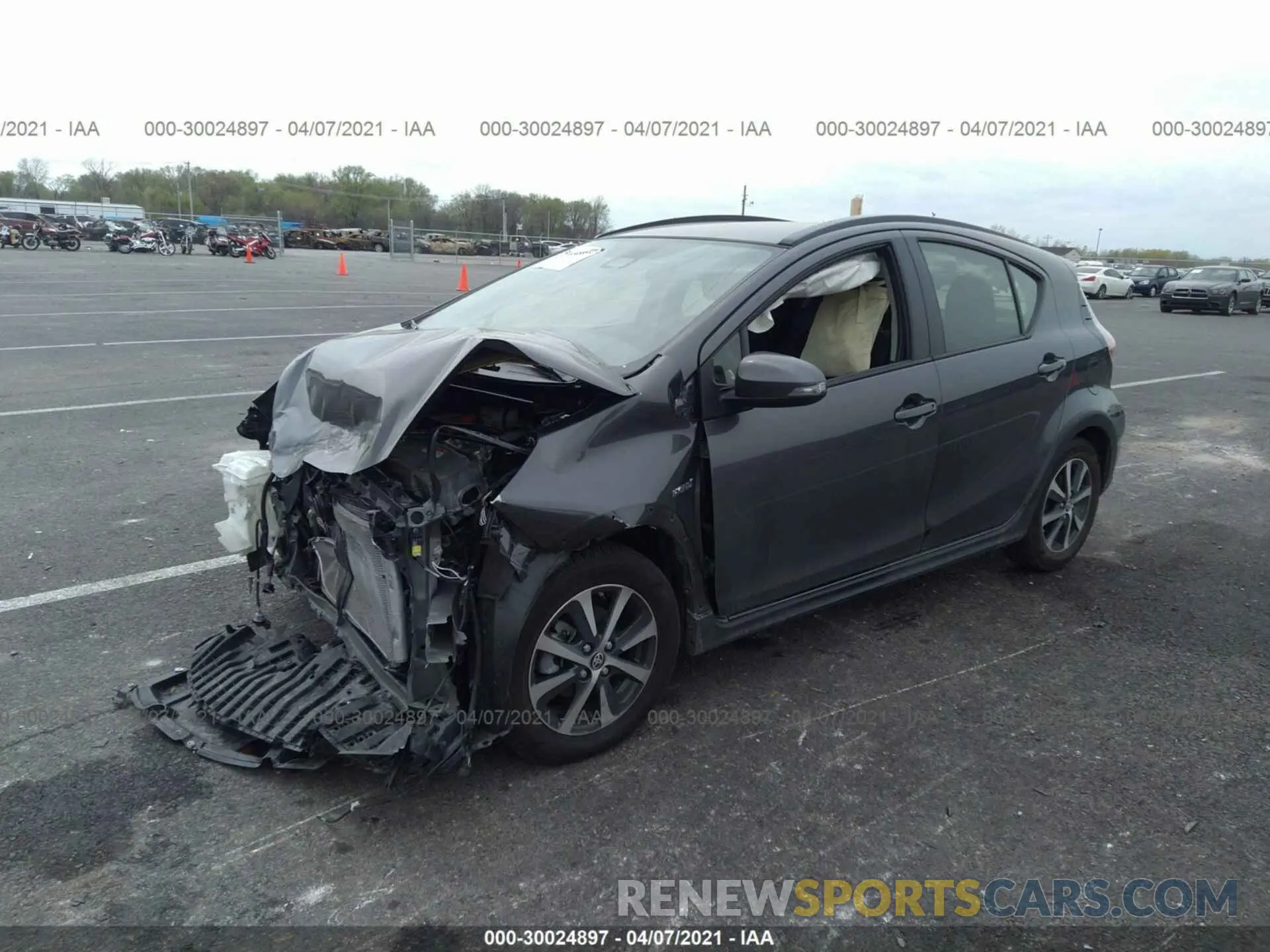 2 fotografías del automóvil dañado JTDKDTB37K1620928 TOYOTA PRIUS C 2019