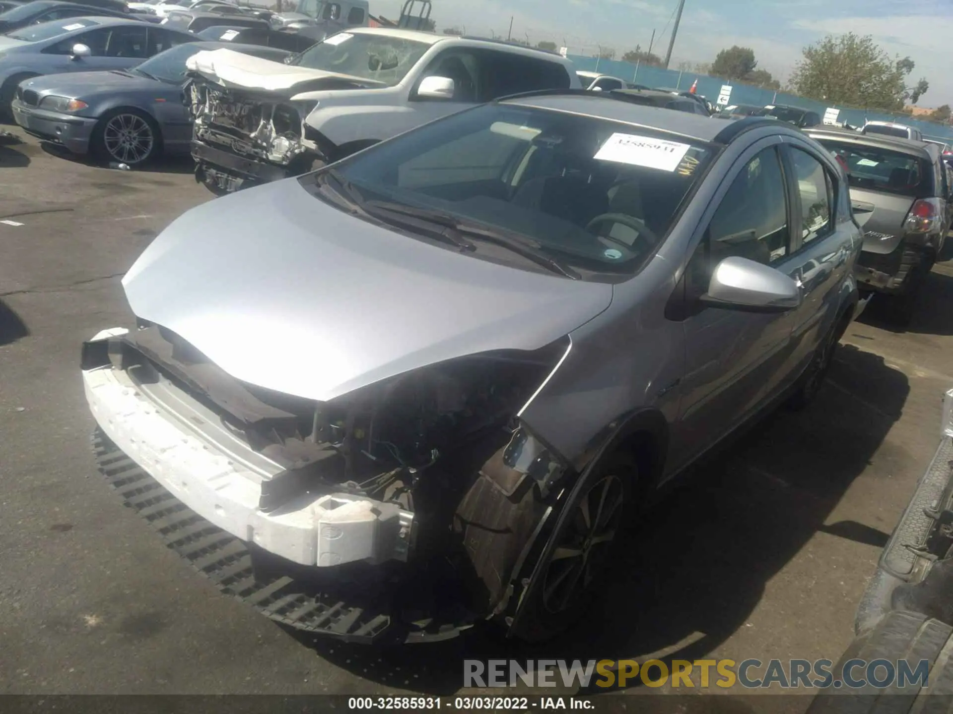 2 fotografías del automóvil dañado JTDKDTB37K1621786 TOYOTA PRIUS C 2019