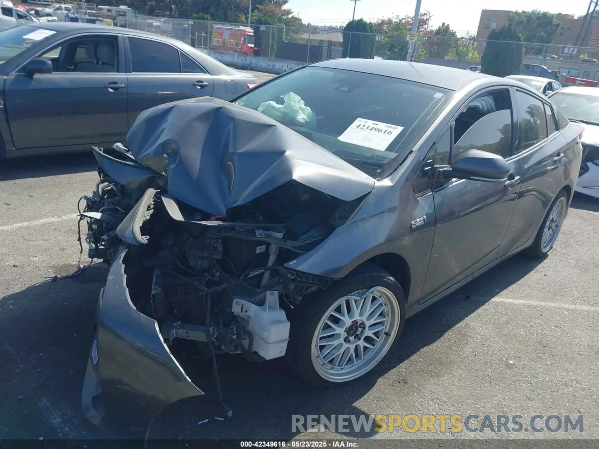 2 fotografías del automóvil dañado JTDKARFP6K3117243 TOYOTA PRIUS PRIME 2019