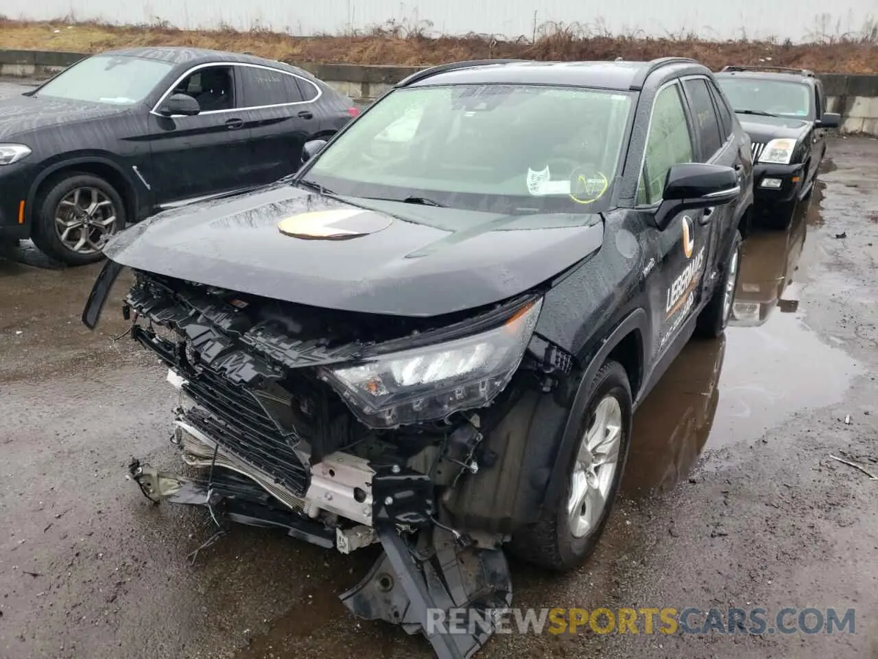 2 fotografías del automóvil dañado JTMMWRFV2KD008099 TOYOTA RAV4 2019