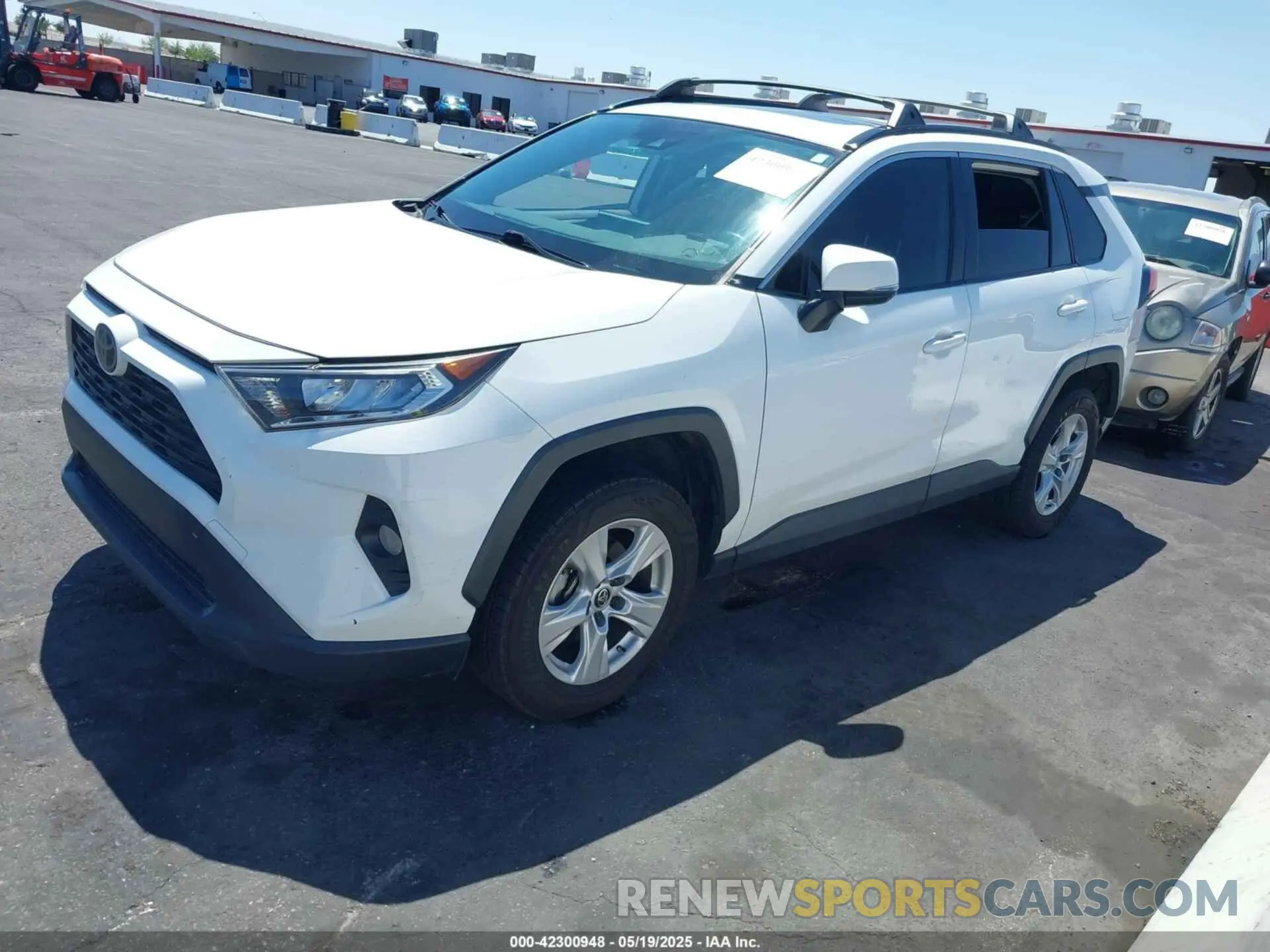 2 fotografías del automóvil dañado JTMP1RFVXKJ002886 TOYOTA RAV4 2019
