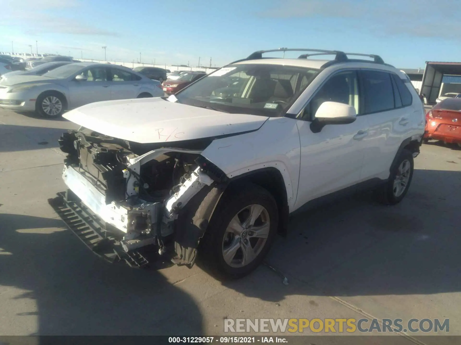 2 fotografías del automóvil dañado JTMW1RFV9KD510812 TOYOTA RAV4 2019